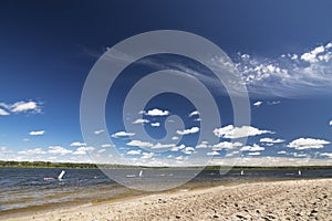 Public swimming area with a sandy beach