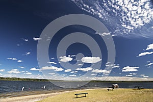 Public swimming area with a sandy beach