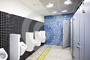 Public toilet with cubicles and urinals