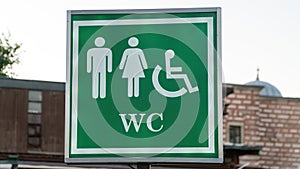 Public toilet sign of restroom with wc sign for men women accessible disabled person in city