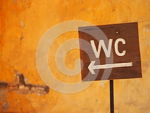 Public toilet (WC, water closet) wooden sign