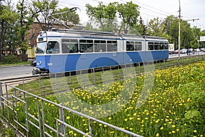 Public transport blue tram vagon on the street in Vinnytsia, Ukraine. May 2021