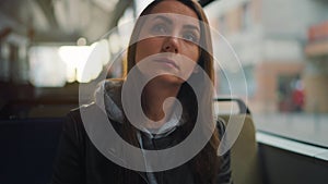 Public transport. Woman in tram using smartphone