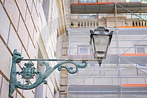 Public wall lamp outside the cloisters of the Ajuda Palace, Lisbon-Portugal. photo