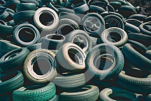 Publish Pile of used rubber tyres, tire dump, environmental concept