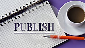 PUBLISH - word in a white notebook on a purple background with a cup of coffee