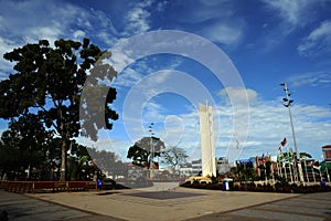 Pucallpa city with garden flower and sculture monument peru