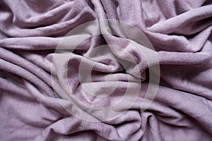 Puce fabric with folds from above photo