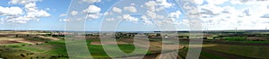Pucka Bay green field and blue cloudy sky panorama photo