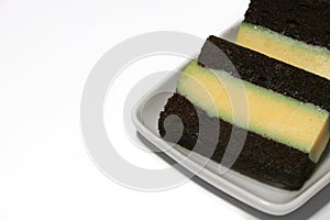 Pudding-covered sponge cake or chocolate-covered sponge cake. Selective focus.