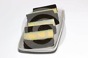 Pudding-covered sponge cake or chocolate-covered sponge cake. Selective focus.