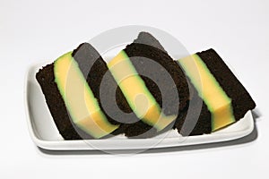 Pudding-covered sponge cake or chocolate-covered sponge cake. Selective focus.