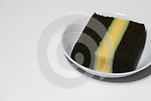 Pudding-covered sponge cake or chocolate-covered sponge cake. Selective focus.