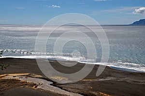 Puddle on the beach of Fonti di Billa