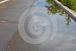 Puddle after rain on the road