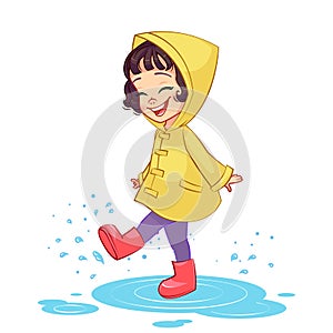 Girl playing in a rain puddle