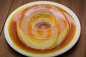 Pudim de leite, a delicious Brazilian flan dessert, with milk ,eggs and condensed milk, topped with caramel sauce. It`s type of