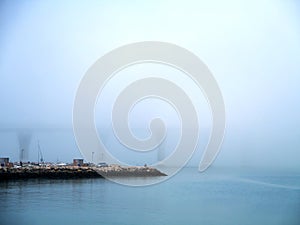 Puente de la Constitucion, called La Pepa, in the fog in the bay of Cadiz capital, Andalusia. Spain.