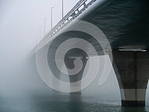 Puente de la Constitucion, called La Pepa, in the fog in the bay of Cadiz capital, Andalusia. Spain.