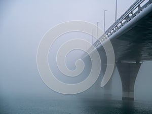 Puente de la Constitucion, called La Pepa, in the fog in the bay of Cadiz capital, Andalusia. Spain.