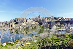 Puente de San Martin bridge over the Tajo river in Toledo photo