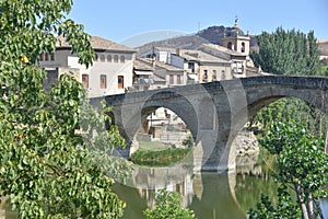 Puente la Reina, Spain - 31 Aug, 2022: Arches of the roman Puente la Reina foot bridge, Navarre, Spain