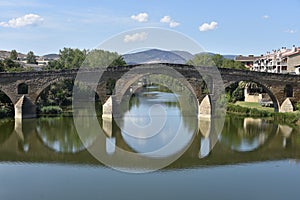 Puente la Reina, Spain - 31 Aug, 2022: Arches of the roman Puente la Reina foot bridge, Navarre, Spain