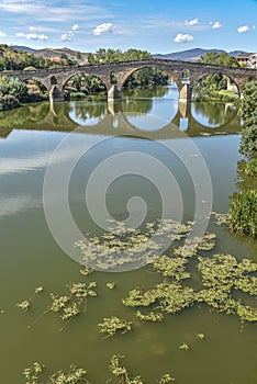 Puente la Reina, Spain - 31 Aug, 2022: Arches of the roman Puente la Reina foot bridge, Navarre, Spain