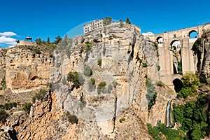 Puente Nuevo bridge and white houses in Ronda, Spain