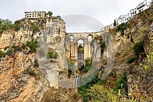 Puente Nuevo in Ronda, Spain spans the 120m deep chasm which divides the city photo