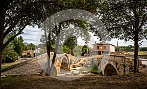 Puente Romano del Priorato - Roman bridge over Tiron River near Cihuri town - and a contemporary bridge next to it.
