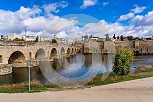 Puente Romano, the Roman Bridge in Merida with the Alcazaba, Extremadura, Spain photo