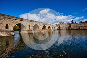 Puente Romano, the Roman Bridge in Merida with the Alcazaba, Extremadura, Spain photo