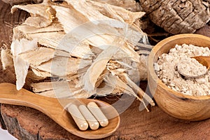 Pueraria mirifica or white kwao krua fruit ,dried slices ,powder and powder in capslue isolated on background