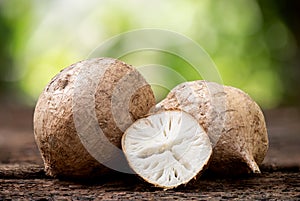 Pueraria mirifica or white kwao krua fruit and slices on an old wood background