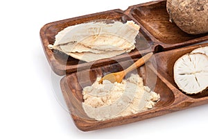 Pueraria mirifica or white kwao krua fruit ,slices and powder isolated on background