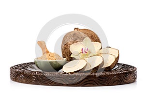 Pueraria mirifica or white kwao krua fruits and powder isolated on white background