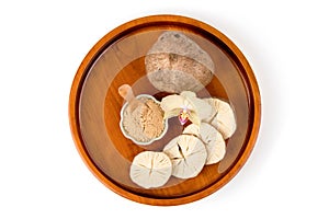 Pueraria mirifica or white kwao krua fruits and powder isolated on white background.top view,flat lay