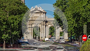 The Puerta de Alcala timelapse is a Neo-classical monument in the Plaza de la Independencia in Madrid, Spain. photo