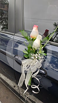 Puerta de auto para novia flores photo