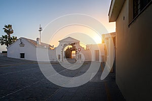 Puerta de la Caleta (La Caleta Gate) at sunset - access to Castle of San Sebastian - Cadiz, Andalusia, Spain photo