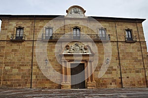 Puerta de la Limosna Building from Plaza Corrada del Obispo square of Oviedo City in Spain photo
