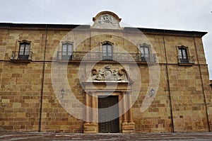 Puerta de la Limosna Building from Plaza Corrada del Obispo square of Oviedo City in Spain photo