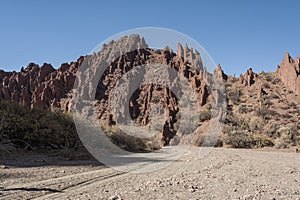 Puerta del Diablo, aka Devils Gate, red rock formation in dry Red Canyon Quebrada de Palmira near Tupiza, Bolivian Andes- Bolivia