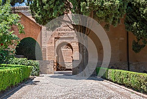 Puerta, patio y jardines dentro del recinto de la Alhambra de Gr photo