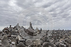 Puerto de la Cruz. Stone piles Cairns on Playa Jardin, Peurto de la Cruz, Tenerife, Canary Islands, Spain. Selfmade rock-monume