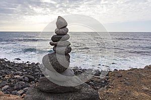 Puerto de la Cruz. Stone piles Cairns on Playa Jardin, Peurto de la Cruz, Tenerife, Canary Islands, Spain. Selfmade rock-monume