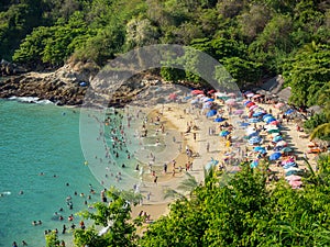 Puerto Escondido, Oaxaca, Mexico, South America: [Playa Carrizalillo, crowdwed natural beach, tourist destination]