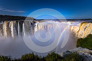 Puerto Iguazu - June 24, 2017: The Devil`s Throat site at the Iguazu Waterfalls, Wonder of the world, at Puerto Iguazu, Argentina