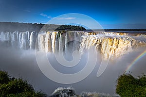 Puerto Iguazu - June 24, 2017: The Devil`s Throat site at the Iguazu Waterfalls, Wonder of the world, at Puerto Iguazu, Argentina